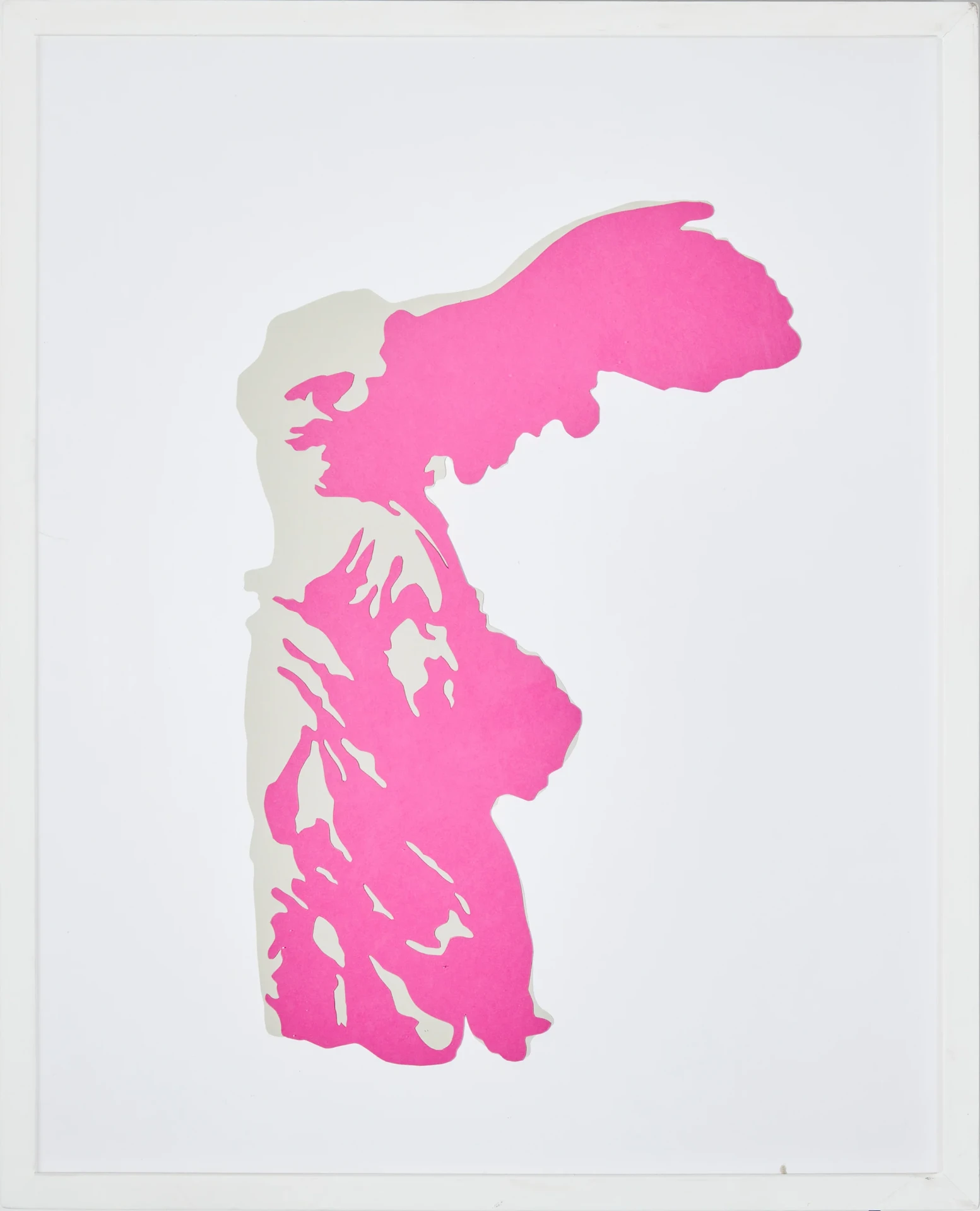 Pink paper cut-out of a winged statue on white
